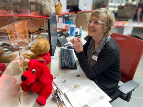 Staff at information desk Staff at information desk